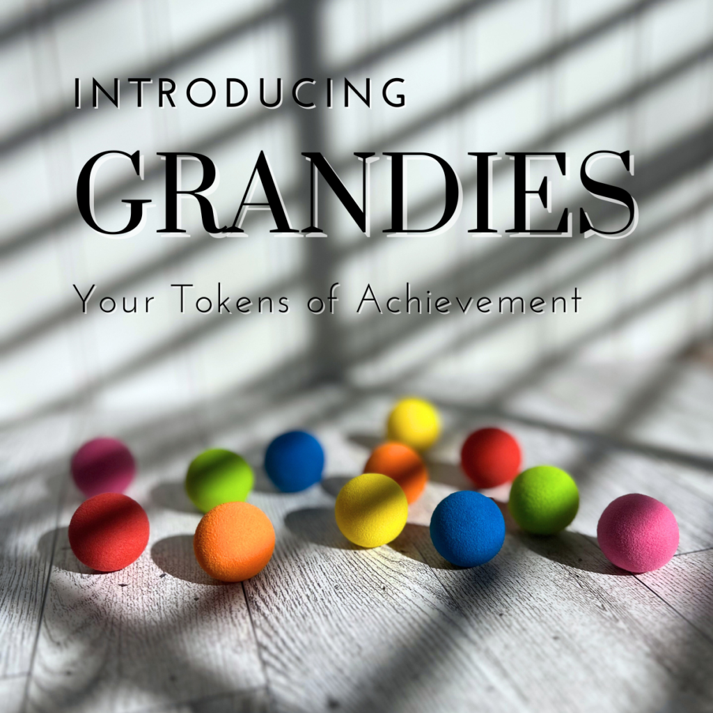 Grandies laid out to see. Grandies are made of soft EVA foam. They come in solid, vibrant colors: red, orange, yellow, and green, blue, and pink.
